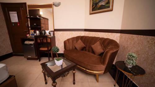 Posezení v ubytování Orchid Inn by WI Hotel