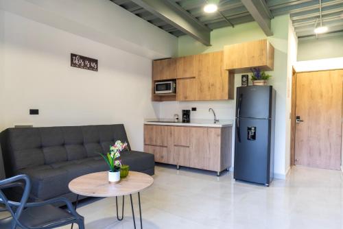 Kuchyň nebo kuchyňský kout v ubytování Nook Apartamentos en el corazón de Medellín