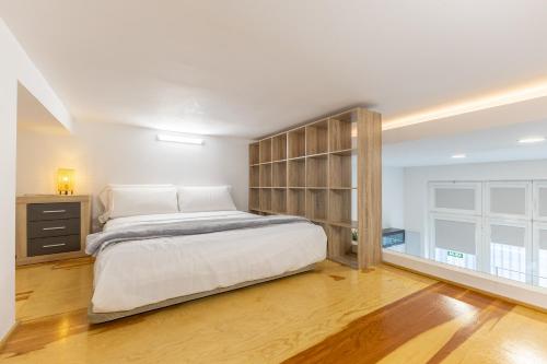 Posteľ alebo postele v izbe v ubytovaní Galileo apartment