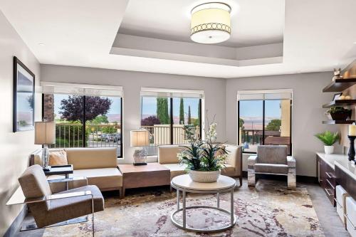 a living room with a couch and chairs at Best Western Plus At Lake Powell in Page