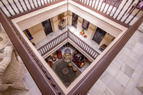 an overhead view of the lobby of a building at Hotel Palacio de Hemingway in Ronda
