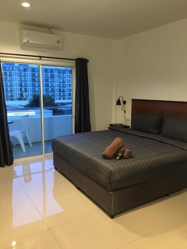 Katil atau katil-katil dalam bilik di Smart Place Pattaya