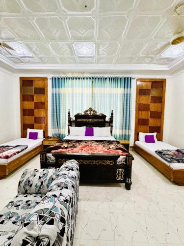 Кровать или кровати в номере Comfort Rezidor Guest House