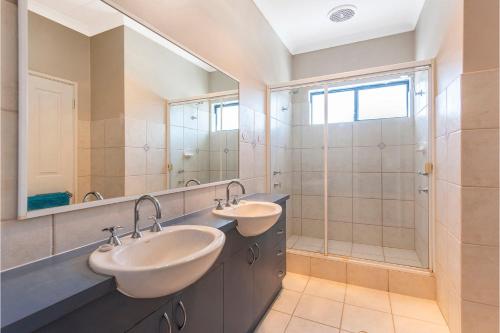 a bathroom with two sinks and a shower at Endless Summer - Perfect Location in Lancelin