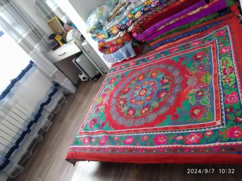 Postel nebo postele na pokoji v ubytování HomeStay in Seitek 11,Kok Jar, Bishkek