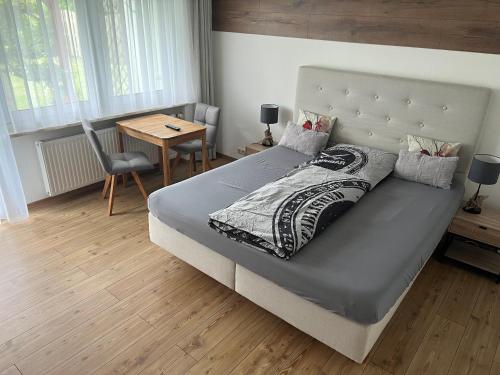 En eller flere senge i et værelse på Das Nistkästchen