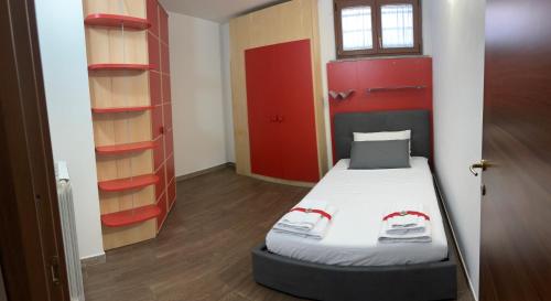 Una cama o camas en una habitación de L'essenziale
