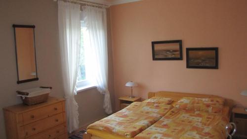 Katil atau katil-katil dalam bilik di Alsóhegyi Apartmanok