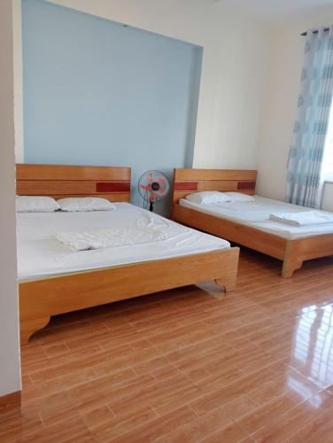 Ένα ή περισσότερα κρεβάτια σε δωμάτιο στο 846e16homstay