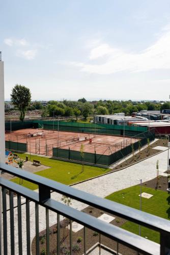 a view of a tennis court from a balcony at Smarald Luxury Apartment in Satu Mare