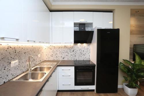 ครัวหรือมุมครัวของ David Center Apartment
