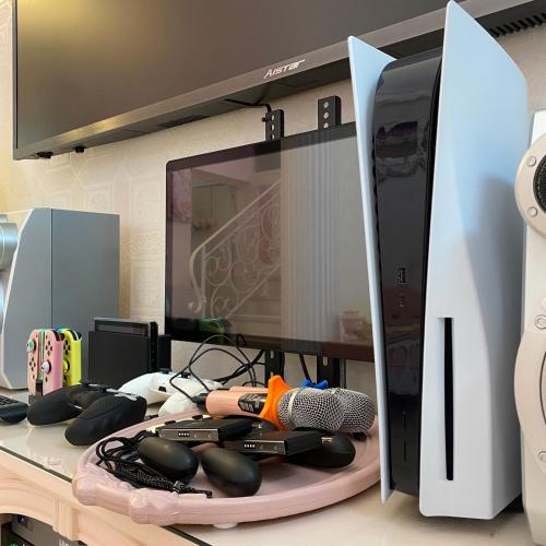 a computer monitor sitting on top of a desk at 春漫小築民宿 in Miaoli