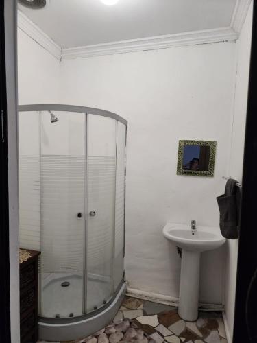 a bathroom with a shower and a sink at Cassiandra Place unit 3 in Richards Bay