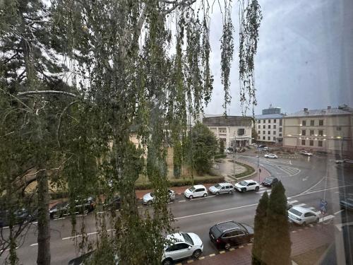 a view of a street with cars parked on the road at Zlata Ultracentral Apartment MV16 in Suceava