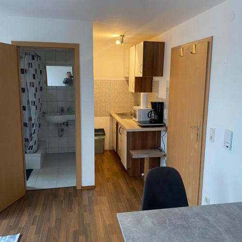 Η κουζίνα ή μικρή κουζίνα στο 1 Zimmer Apartment DG