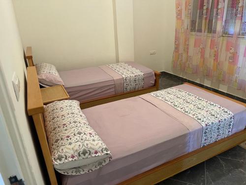 two bunk beds in a room with at Apartamento con vistas al mar 3 in Al Hoceïma