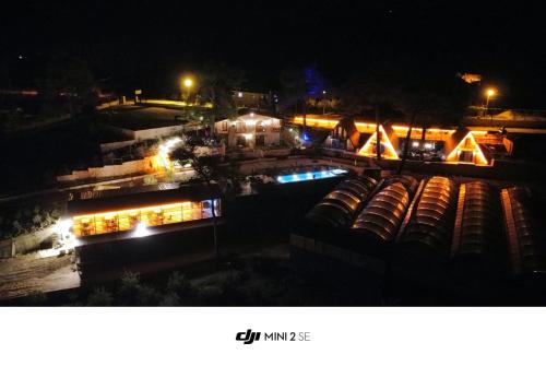 a view of a building at night with lights at Kandybos Eco Farm Village in Kas