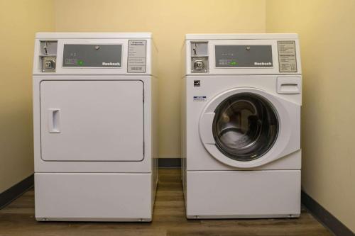 two washing machines next to each other in a room at Quality Inn & Suites Lexington South in Lexington