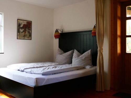 Katil atau katil-katil dalam bilik di Grünes Tal Wohnung Berta