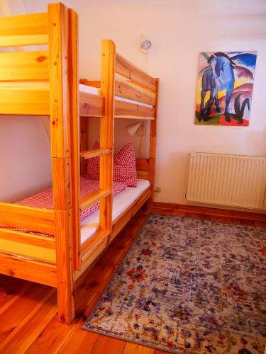 Ένα ή περισσότερα κρεβάτια σε δωμάτιο στο Grünes Tal Wohnung Berta
