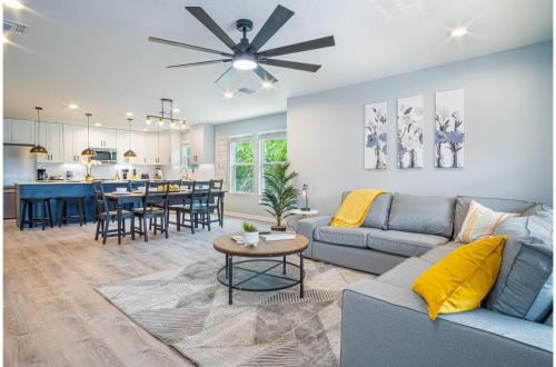 a living room with a couch and a table at Comfortable 4BR2.5BA Family Home Near Riverwalk in San Antonio