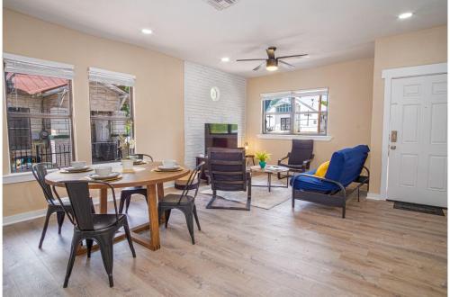 a dining room with a table and chairs at Modern Living 3BR2BA Close to Amazing Downtown in San Antonio