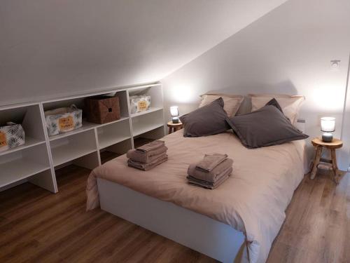 En eller flere senge i et værelse på Maison 120 m2 à Gerardmer proche centre ville