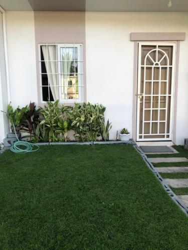 Κήπος έξω από το New Cozy Home in Dumaguete