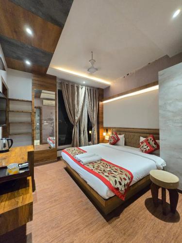 Katil atau katil-katil dalam bilik di A Palace on River ( Rashmi Guest House )