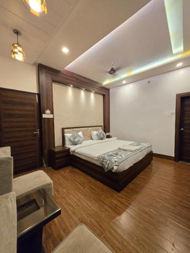 Katil atau katil-katil dalam bilik di A Palace on River ( Rashmi Guest House )