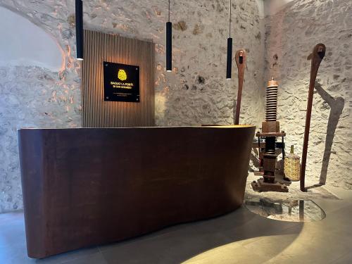 a counter with a guitar in a room at Baglio La Porta by Geocharme in San Vito lo Capo