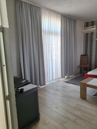 Ένα ή περισσότερα κρεβάτια σε δωμάτιο στο Apartmani Marijanovic