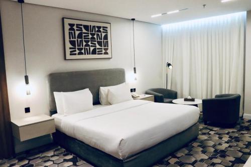Katil atau katil-katil dalam bilik di Continent Al Waha Hotel Riyad