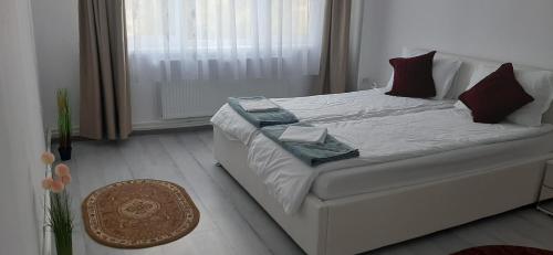 Postel nebo postele na pokoji v ubytování Apartament Antonia&Alex