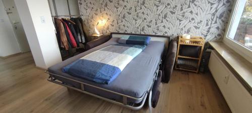 Ένα ή περισσότερα κρεβάτια σε δωμάτιο στο Wohnung im Zentrum mit Ausblick