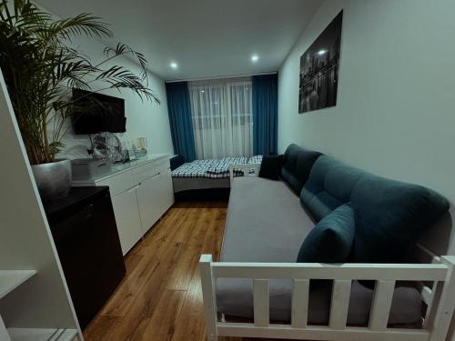 TV o dispositivi per l'intrattenimento presso Hotel NOCLEGI WRZOSOWA Siedlce