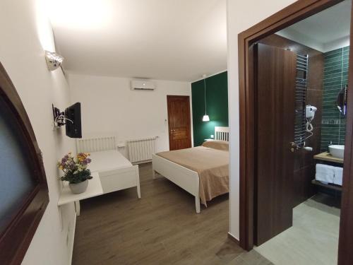 Postel nebo postele na pokoji v ubytování Casa di Lele