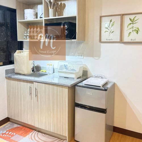 a kitchen with a counter and a sink at 2BR Condo for Rent near Highway in Marilao