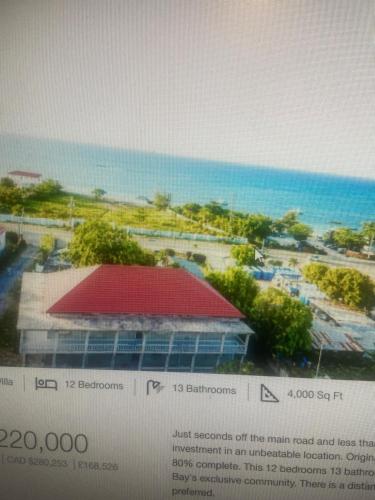 a picture of a building with a view of the ocean at Salem Suites in Salisbury