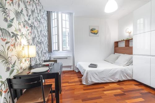 Una cama o camas en una habitación de Studio en plein cœur de la vieille ville à Nice