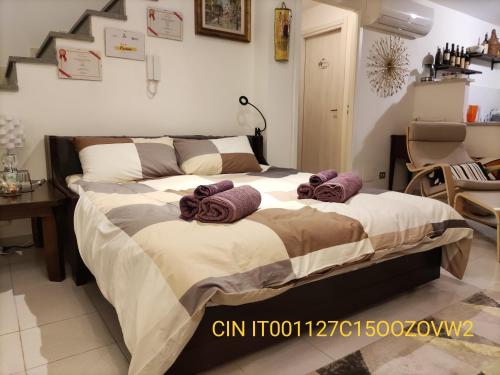 Una cama o camas en una habitación de B&B Firmino