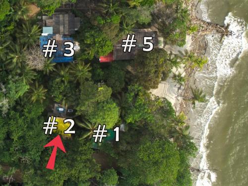 an overhead view of a beach with numbers on it at Las Cabañas de Mario in Necoclí