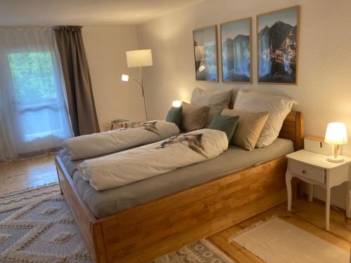a bed in a living room with at Eistänzer Nest in Oberstdorf