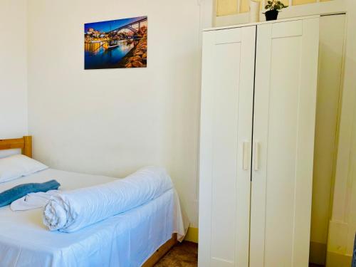 Ένα ή περισσότερα κρεβάτια σε δωμάτιο στο Alfama Guest House