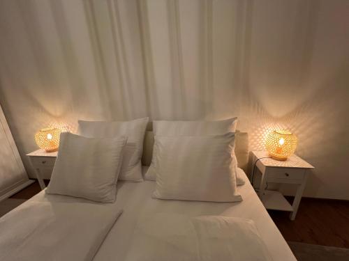 Postel nebo postele na pokoji v ubytování Villach City Comfort Suite