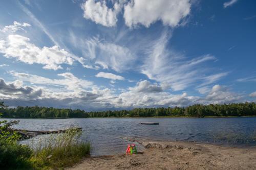 a view of a lake under a cloudy sky at Krok in Värmdö