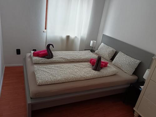 Una cama o camas en una habitación de Apartment EMMA