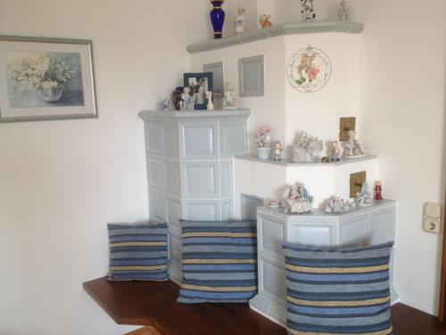 a room with two white cabinets and two striped pillows at Spacious apartment near Linz, Wels & Marchtrenk in Buchkirchen