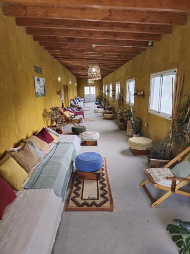 Pomancillo Ecolodge tesisinde bir odada yatak veya yataklar