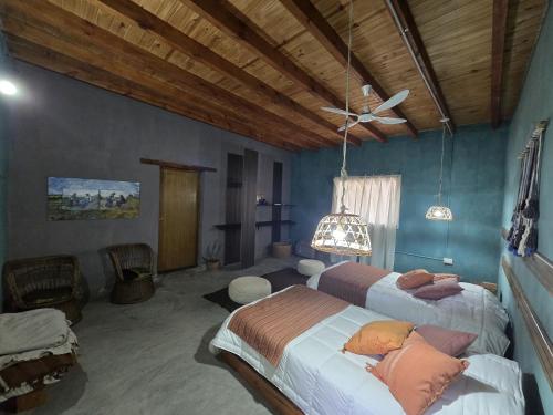Postel nebo postele na pokoji v ubytování Pomancillo Ecolodge